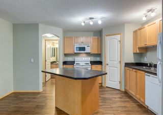 Photo 4: 102 150 Panatella Landing NW in Calgary: Panorama Hills Row/Townhouse for sale : MLS®# A2052603