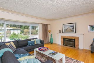 Photo 1: 4565 CAPILANO Road in North Vancouver: Canyon Heights NV House for sale : MLS®# R2146076