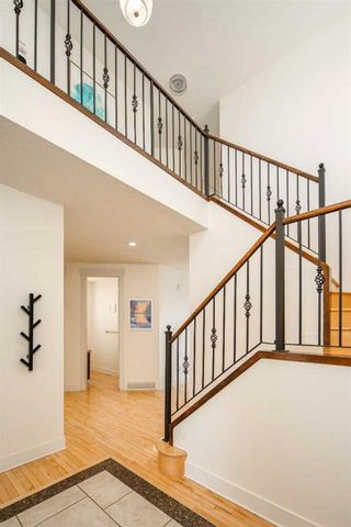 Photo 10: 222 Tremblant Place SW in Calgary: Springbank Hill Detached for sale : MLS®# A2125693