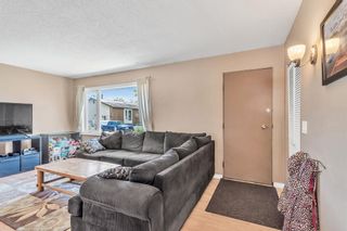 Photo 3: 908 Olympia Crescent SE in Calgary: Ogden Detached for sale : MLS®# A2138434