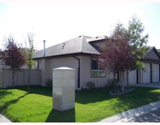 Photo 20: 29 103 FAIRWAYS Drive NW: Airdrie Townhouse for sale : MLS®# C3394364