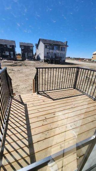 Photo 14: 301 Waterford Boulevard: Chestermere Row/Townhouse for sale : MLS®# A2131304