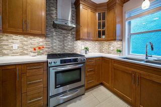 Photo 6: 1932 CHARLES Street in Vancouver: Grandview Woodland 1/2 Duplex for sale (Vancouver East)  : MLS®# R2393461