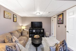 Photo 29: 106 Strathlorne Mews SW in Calgary: Strathcona Park Row/Townhouse for sale : MLS®# A1174641