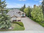 Main Photo: 3042 Signal Hill Drive SW in Calgary: Signal Hill Detached for sale : MLS®# A2138237