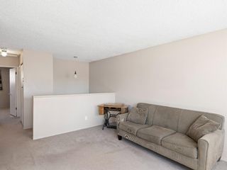 Photo 4: 408 60 Avenue NE in Calgary: Thorncliffe Semi Detached for sale : MLS®# A1190074