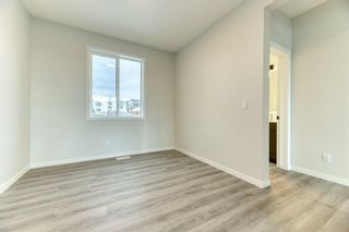Photo 9: 108 Rowmont Boulevard NW in Calgary: C-483 Detached for sale : MLS®# A2099400