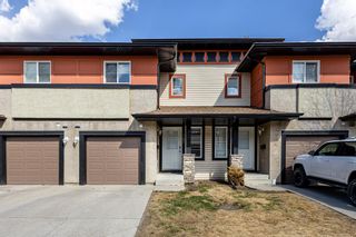 Main Photo: 141 Eversyde Common SW in Calgary: Evergreen Row/Townhouse for sale : MLS®# A2046503