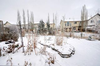Photo 4: 133 Cougarstone Place SW in Calgary: Cougar Ridge Semi Detached for sale : MLS®# A1050548