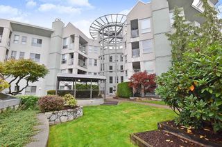 Photo 1: 406 2585 WARE Street in Abbotsford: Central Abbotsford Condo for sale in "The Maples" : MLS®# R2411293