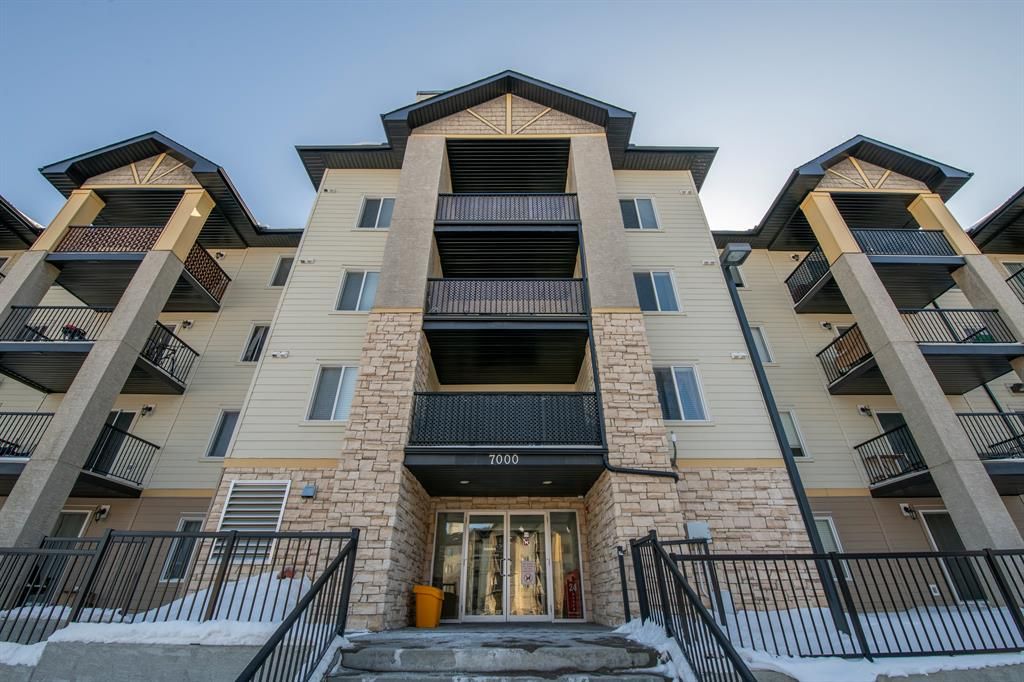 Main Photo: 7203 304 Mackenzie Way SW: Airdrie Apartment for sale : MLS®# A2032823