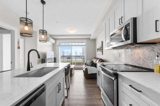 Photo 5: 219 400 Auburn Meadows Common SE in Calgary: Auburn Bay Apartment for sale : MLS®# A2130171