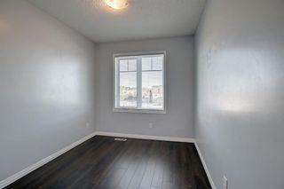 Photo 37: WINDSONG in Airdrie: Row/Townhouse for sale