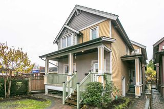Photo 1: 1648 E 12TH Avenue in Vancouver: Grandview VE 1/2 Duplex for sale in "GRANDVIEW WOODLANDS" (Vancouver East)  : MLS®# R2222114