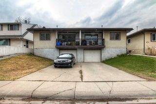 Main Photo: 11205/11207 11 Street SW in Calgary: Southwood Full Duplex for sale : MLS®# A2126343
