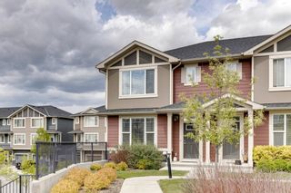 Photo 2: 214 Panatella Walk NW in Calgary: Panorama Hills Row/Townhouse for sale : MLS®# A1225557