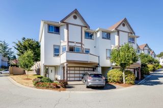 Photo 1: 101 1232 JOHNSON Street in Coquitlam: Scott Creek Townhouse for sale in "GREEN HILL PL" : MLS®# R2725087