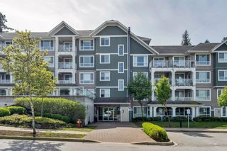 Photo 1: 104 16388 64 Avenue in Surrey: Cloverdale BC Condo for sale in "The Ridge at Bose Farms" (Cloverdale)  : MLS®# R2875044