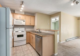 Photo 10: 1211 70 Panamount Drive NW in Calgary: Panorama Hills Apartment for sale : MLS®# A2054811