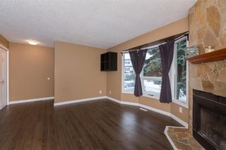 Photo 3: 127 DEER RIDGE Place SE in Calgary: Deer Ridge House for sale : MLS®# C4176684