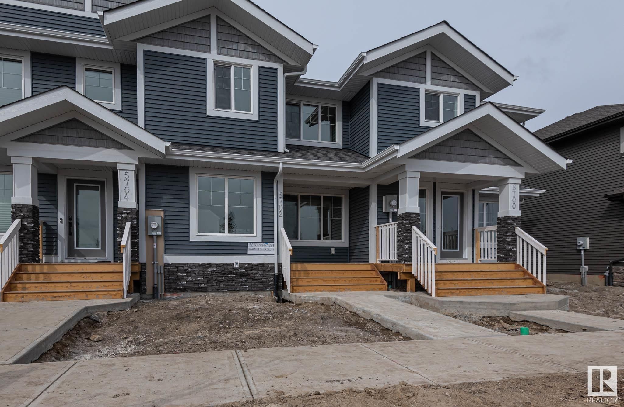 Main Photo: 5702 JUCHLI Avenue in Edmonton: Zone 27 Attached Home for sale : MLS®# E4288449