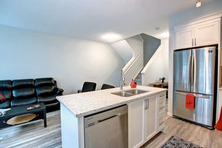 Photo 17: 671 101 Sunset Drive: Cochrane Row/Townhouse for sale : MLS®# A2010546
