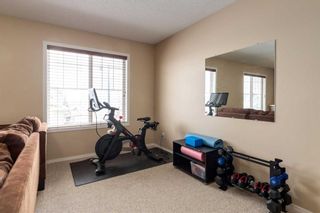 Photo 21: 200 Cougartown Close SW in Calgary: Cougar Ridge Detached for sale : MLS®# A2124049