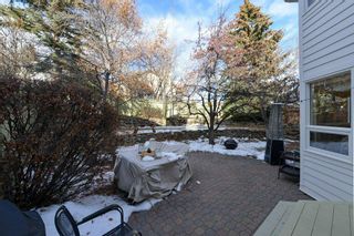 Photo 6: 30 Sienna Bay SW in Calgary: Signal Hill Detached for sale : MLS®# A2024508