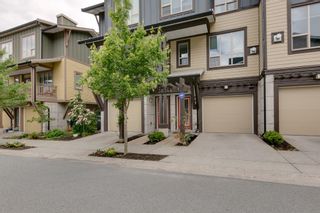 Photo 1: 38344 EAGLEWIND Boulevard in Squamish: Downtown SQ Townhouse for sale in "Eaglewind-Streams" : MLS®# R2178583