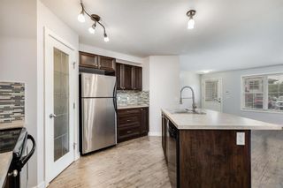Photo 8: 104 120 Panatella Landing NW in Calgary: Panorama Hills Row/Townhouse for sale : MLS®# A2051554