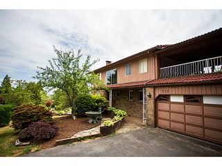 Photo 1: 338 OXFORD Drive in Port Moody: College Park PM House for sale : MLS®# V1129682