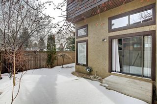 Photo 6: 14 Glamis Gardens SW in Calgary: Glamorgan Row/Townhouse for sale : MLS®# A1076786