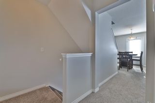 Photo 19: 104 Windstone Link SW: Airdrie Row/Townhouse for sale : MLS®# A1190179