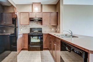 Photo 5: 1407 92 CRYSTAL SHORES Road: Okotoks Apartment for sale : MLS®# A1222250