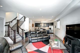 Photo 4: 140 12 Avenue NW in Calgary: Crescent Heights Row/Townhouse for sale : MLS®# A1217492