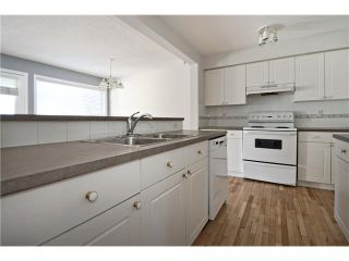 Photo 3: 113 COUGARSTONE Place SW in CALGARY: Cougar Ridge Residential Attached for sale (Calgary)  : MLS®# C3598233