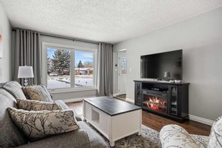 Photo 14: 75 Midvalley Rise SE in Calgary: Midnapore Semi Detached (Half Duplex) for sale : MLS®# A2104566