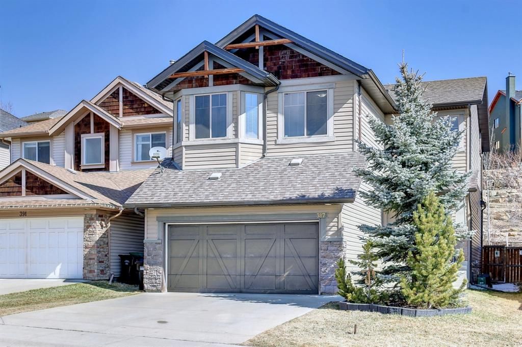 Main Photo: 387 St. Moritz Drive SW in Calgary: Springbank Hill Detached for sale : MLS®# A1185997