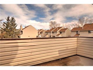 Photo 8: 248 54 GLAMIS Green SW in Calgary: Glamorgan House for sale : MLS®# C4109785