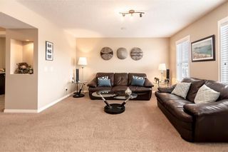 Photo 13: 325 BRIDLERIDGE View SW in Calgary: Bridlewood House for sale : MLS®# C4177139