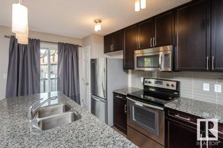 Photo 16: 4007 ORCHARDS Drive in Edmonton: Zone 53 Townhouse for sale : MLS®# E4313415