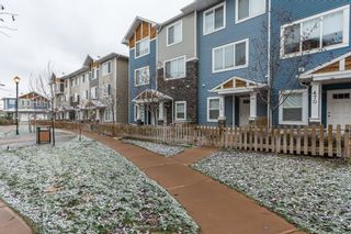Photo 1: 168 2802 Kings Heights Gate SE: Airdrie Row/Townhouse for sale : MLS®# A1062049