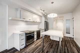 Photo 3: 103 730 5 Street NE in Calgary: Renfrew Apartment for sale : MLS®# A2011808
