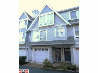 Photo 1: 70 16388 85TH Avenue in Surrey: Fleetwood Tynehead Townhouse for sale in "Camelot Village" : MLS®# F1106811