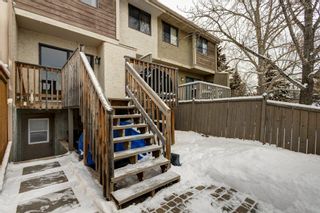 Photo 25: 143 Woodvale Bay SW in Calgary: Woodlands Row/Townhouse for sale : MLS®# A2022754