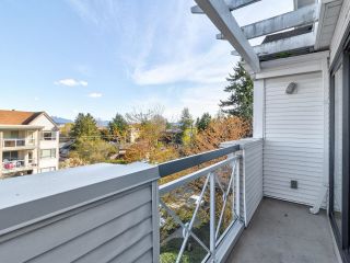 Photo 14: 403 20268 54 Avenue in Langley: Langley City Condo for sale in "BRIGHTON PLACE" : MLS®# R2684565