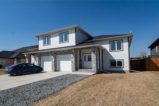 Main Photo: 44 Sand Piper Trail North in Landmark: R05 Residential for sale : MLS®# 202408512