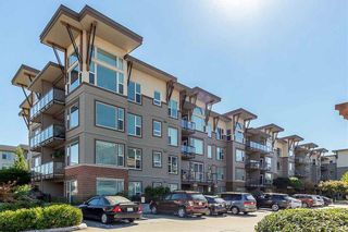 Photo 1: 413 33539 HOLLAND Avenue in Abbotsford: Central Abbotsford Condo for sale in "The Crossing" : MLS®# R2465000