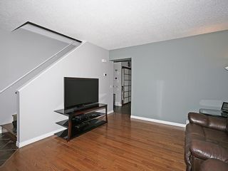 Photo 11: 121 999 CANYON MEADOWS Drive SW in Calgary: Canyon Meadows House for sale : MLS®# C4113761