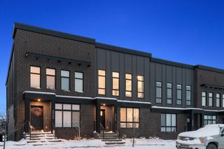 Photo 1: 3048 85 Street SW in Calgary: Springbank Hill Row/Townhouse for sale : MLS®# A2111255